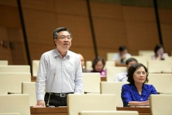 Bộ trưởng Bộ Xây dựng Nguyễn Thanh Nghị tham gia trả lời chất vấn - Ảnh: VGP/Nhật Bắc